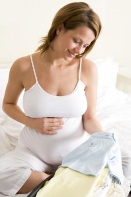 pregnant woman smiling down