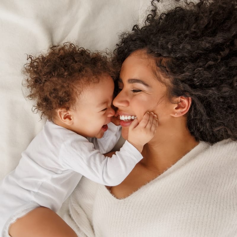 happy mom with baby